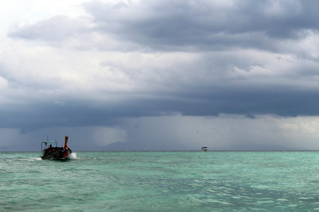 thai boat cloudy sky