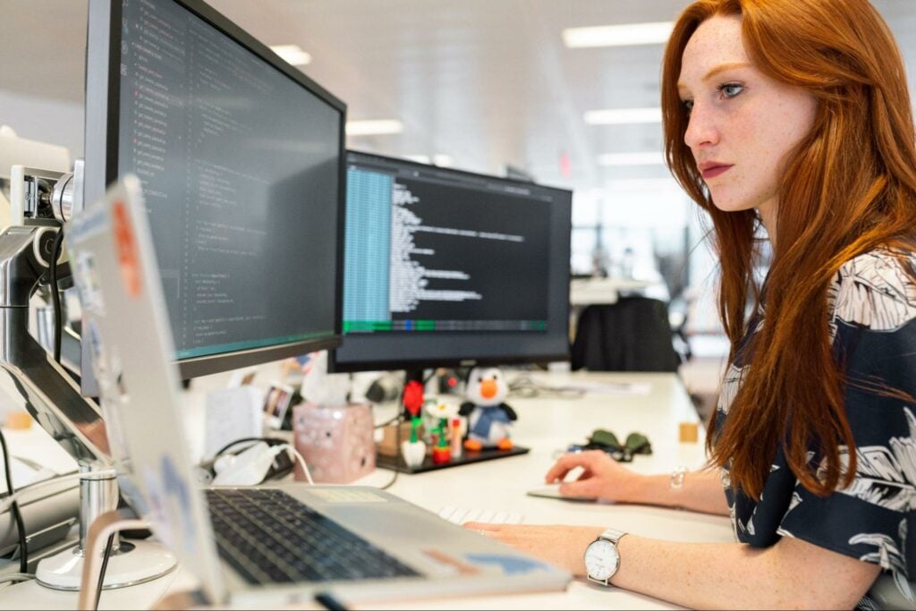 Red hair Woman coding IT