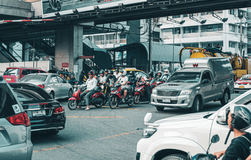 An intersection in the usual metro area of Bangkok. Traffic laws here are rarely enforced